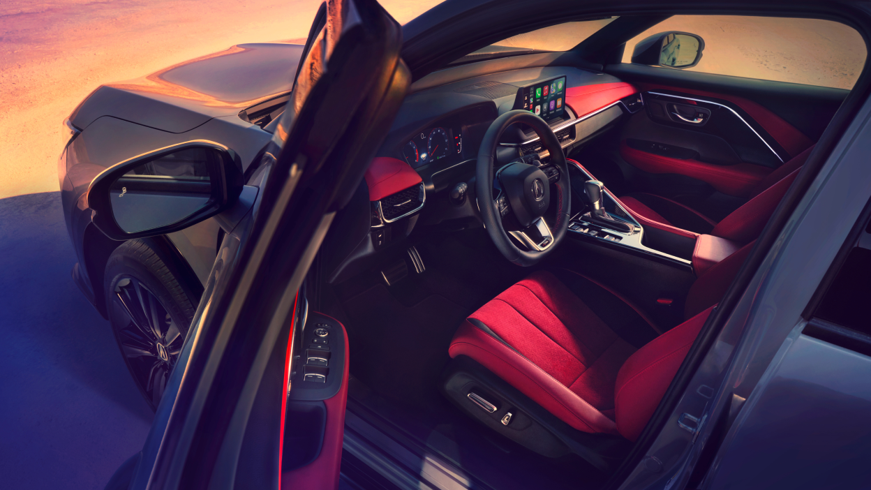 Close up side-view of Acura ADX showing the interior.