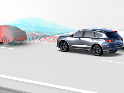 Digital rendering, where everything is white except for the MDX. 3/4 side rear view of grey MDX driving on road. Blue sensor lines and red waves emitting from the front of the MDX detect the car in front.